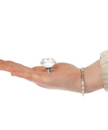 Hand holding a 26 Pack Crystal Clear Glass Cabinet Knobs Diamond Cut Drawer Pulls One And A Quarter Inch Diamond, Three Quarter Inch Base.