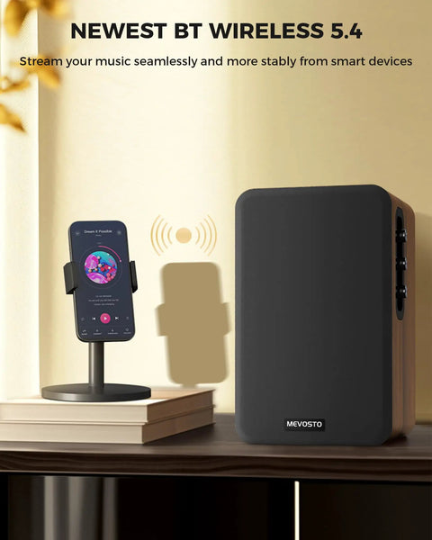 Beefy Bass Bookshelf Speakers 36W RMS BT Five Four Wireless Studio Monitors beside a smartphone, showcasing Bluetooth 5.4.