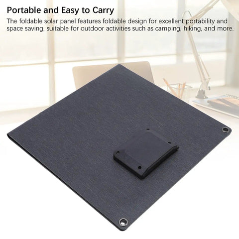 Foldable 24W Solar Panel Charger With 5V USB Output for Outdoor Camping And Hiking Monocrystalline Silicon Portable Solar Charger displayed outdoors
