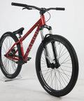Salire SJ-50 Dirt Jumper Bike With Disc Brakes And 26 Inch Wheels, shown from a side angle, displaying its steel frame and fork.