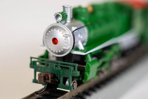 Front view of Prairie 2 6 2 Locomotive and Tender N Scale Green Train Set for Model Railroading on track