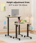 Slick 32 Inch Electric Standing Desk Built Tough With Swivel Rolling Casters And No Sweat Height Switches For A Go To Remote Work Spot You Will Love, showing height adjustment from 29.9 to 48.4 inches.