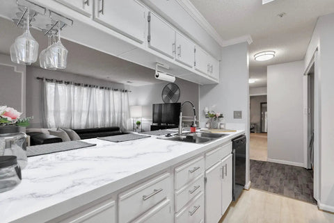 White Marble Countertop Paint Kit for Kitchen and Bathroom installed on kitchen counter with glossy finish