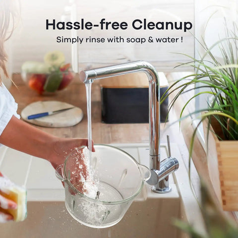 Person rinsing glass bowl from Two Bowls 450W Food Processor With Meat Grinder And Veggie Chopper in kitchen sink