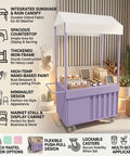 Outdoor Mobile Food Cart With Awning Portable Rolling Vending Station For Side Hustlers Pop Up Fairs Featuring Trendy Pink Macaron Design And Cream Pointed Canopy Storage Bin For Drinks And Treats, showcasing purple cart with canopy and products.