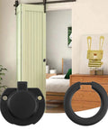 Four Pack Matte Black Recessed Ring Pull Handles For Cabinets And Drawers shown in a bedroom with barn door, zinc alloy finish.