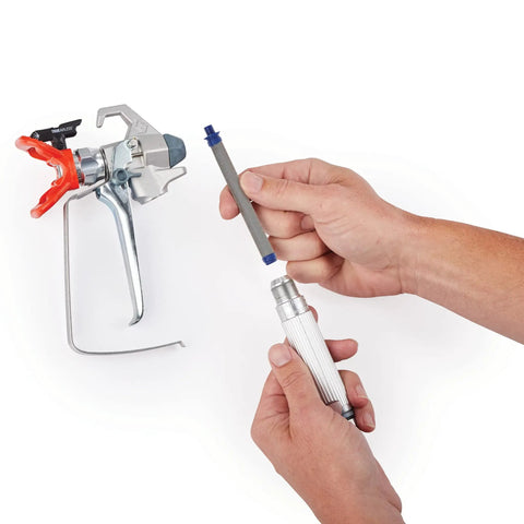 Hands assembling Airless Spray Gun SG3 Pro Kit For Heavy Duty Coatings 3600 PSI Four Finger Trigger With Safety Lock