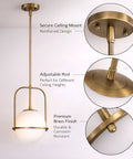 Close-up of Slick Brass Pendant Light For Kitchen Island With Adjustable Height showing ceiling mount and glass globe.