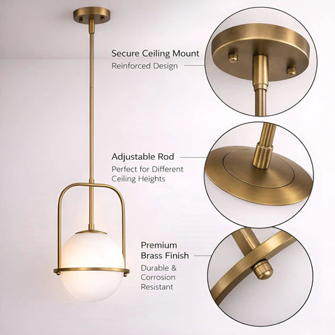 Close-up of Slick Brass Pendant Light For Kitchen Island With Adjustable Height showing ceiling mount and glass globe.