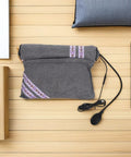 Super Cozy USB Inflatable Heated Neck Pillow With Washable Cotton Cover And Relaxing Aroma For Ultimate Work Travel Stress Relief And Healthy Posture Support in grey, with a USB cord and design detail on cover.