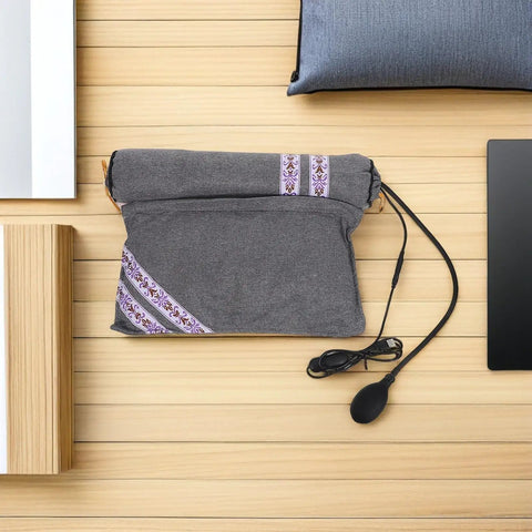 Super Cozy USB Inflatable Heated Neck Pillow With Washable Cotton Cover And Relaxing Aroma For Ultimate Work Travel Stress Relief And Healthy Posture Support in grey, with a USB cord and design detail on cover.