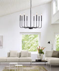 Dope Black Farmhouse Dining Room Chandelier With Adjustable Height Eight Candle Arms Pendant Light Fixture For Living Room Kitchen Island And Foyer Modern Matte Black Metal Lighting hanging in a modern living room.