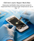 Technician using Anti Static Mat Kit For Electronics And Computer Repair With Esd Wrist Strap Grounding Wire And Grounding Plug 15.7in By 11in Heat Resistant Soldering Pad for phone repair