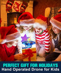 Children in Christmas hats playing with Hand Operated Kids Drone With AI Motion Sensor, Rechargeable Mini Quadcopter That Auto Hover