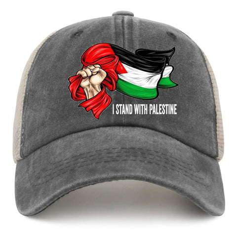 Gray trucker hat with "I Stand with Palestine" text and raised fist design, breathable cotton material, low profile fit.