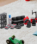 Top Shelf Miniature Vehicle Repair Shop Scene Featuring Resin Seats And Tire Balancing Machine For Collectible Scale Dioramas And Knockout Model Garage Displays with various mini furniture and tools