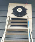 50 Watt Solar Exhaust Fan For Attics, Garages, Greenhouses, Barns And Sheds With Waterproof Build, No Fuss Install, On Off Switch, Prewired For Easy Install, Solar Powered Cooling For RVs And Gable Vents, Made In USA on a wall with ladder
