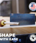 Top Shelf High Carbon Steel Rectangle Card Scraper Set Delivering Knockout Performance On Fine Woodworking Projects, close-up of scraper on wood.
