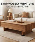 Trimmable Rubber Shims For Wobbly Furniture, under a modern coffee table, preventing wobbling on uneven floors.