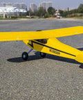 J-3 Cub Balsa Wood Model Airplane Kit With 46 Inch Wingspan Laser Cut DIY RC Plane Build For Adults Functional Landing Gear Realistic Cowl And Windscreen Included on runway