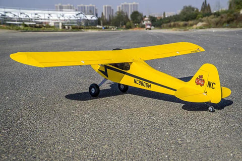 J-3 Cub Balsa Wood Model Airplane Kit With 46 Inch Wingspan Laser Cut DIY RC Plane Build For Adults Functional Landing Gear Realistic Cowl And Windscreen Included on runway