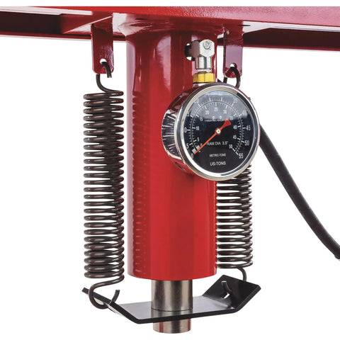Close-up of gauge on Heavy Duty 50 Ton Air Hydraulic Shop Press With Auto Pump Motor showing pressure and springs.
