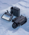 Mavic 4 Pro Drone Creator Bundle With 512GB, 6K60 HDR, 100MP Hasselblad Wide on ice with controller and charging hub