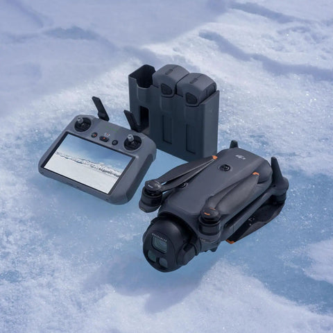 Mavic 4 Pro Drone Creator Bundle With 512GB, 6K60 HDR, 100MP Hasselblad Wide on ice with controller and charging hub