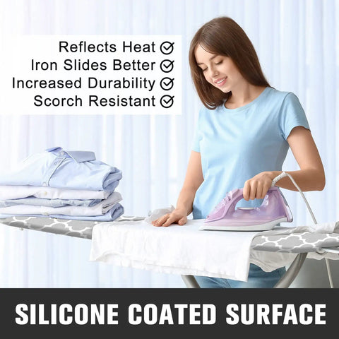 Woman ironing on Standard Size 15 X 54 Inches Ironing Board Cover And Pad With Four Layer Extra Thick Padding Resists Scorching And Stains Elastic Edge And Two Straps For A Snug Fit Gray