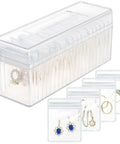 Clear Acrylic Jewelry Box Organizer With 20 Anti Tarnish Bags shown with compartments holding earrings, rings, and necklaces