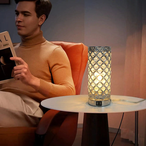 Crystal Table Lamp With 3 Way Dimmable Touch Control, Wireless Charging Pad And Dual USB Ports, illuminated on side table