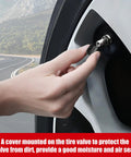 Hand attaching a Premium Tire Valve Cap With O Ring For Cars, Bicycles, Motorcycles, SUVs And Trucks Black 100 Count Pack onto wheel valve.