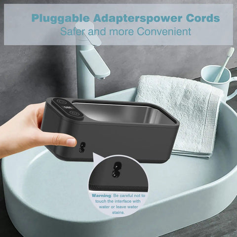Hand holding Pro Ultrasonic Jewelry Cleaner For Rings Glasses Dentures Retainers And Watches Stand 680ml Tank near sink