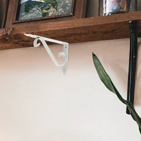 Heavy Duty Corner Shelf Brackets Wall Mount Supports Rock Solid Iron L Brackets Built Like A Tank For Diy Wood Shelving And Workshop Storage Super Sturdy Black Metal Braces Zero Stress Setup white corner bracket mounted on a rustic shelf