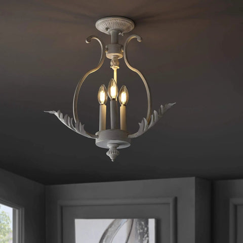 Antique White 12.2 Inch 3 Light Iron Semi Flush Mount Ceiling Fixture With Candle Style Design in cozy room.