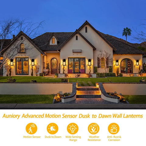 House with 2 Pack Motion Sensor Outdoor Wall Lights Dusk To Dawn Matte Black Porch Lanterns illuminating entrance