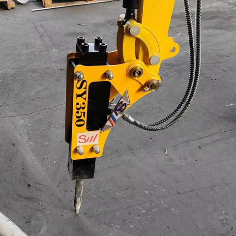 Workhorse Heavy Duty 1-1.5 Ton Mini Excavator Attachment Kit hydraulic breaker close-up on construction site