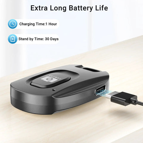 Two Pack Wireless Remote Shutter For iPhone And Android Cameras Bluetooth Photo Clicker charging on desk