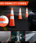 Six Pack 28 Inch Traffic Safety Cones Orange Heavy Duty Construction Cone Set for Roadway Parking and Public Place Traffic Control Pro Grade Weather Resistant PVC in use on a dimly lit road.