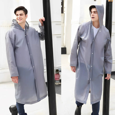Model wearing Ultra Lightweight Reusable Rain Ponchos For Adults 2 Pack With Hood Unisex Waterproof Rain Gear in urban setting