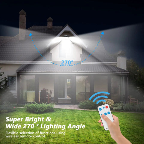 Solar Outdoor Lights Four Head Motion Sensor Flood Lights IP65 Waterproof illuminate house facade with remote control in hand