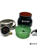 4-inch Turbo Boost Leak Tester kit with black main housing, green 6061-aluminum plates, gauge, and fittings.