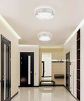 Brighten Up Your Space With A Modern 11 Inch Flush Mount Crystal LED Ceiling Light 4000K Daylight White 1980 Lumens K9 Crystal Beads Ideal For Kitchen Bathroom Bedroom And Hallway installed in hallway.