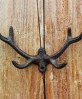 Premium Cast Iron Deer Antler Wall Hooks Bringing Serious Vintage Soul And Dang Solid Durability To Your Entryway While Making Coat Hat Towel And Key Organization An Absolute Breeze With Every Necessary Hardware Piece Packed Inside mounted on wood.