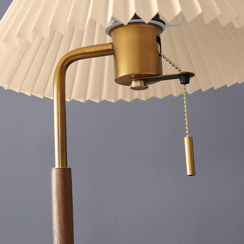 Close-up of USB Wireless Charging Desk Lamp With Wood And Gold Finish showing pull chain and fabric shade detail.