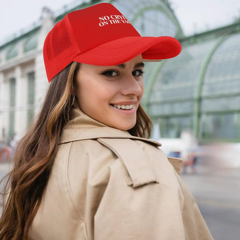 Woman wearing red womens breathable golf hat with six vent eyelets low profile unstructured cap moisture wicking sweatband.