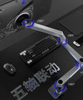 Heavy Duty Height Adjustable Monitor Mount With Extended Reach For Slick Gaming And Desk Setups Featuring No Sweat Install Ball Pivot Tilt Swivel And Beefy Aluminum Frame on gaming desk with keyboard and mouse.