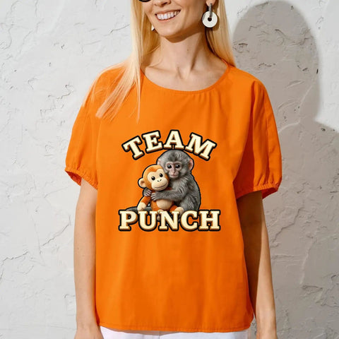 Woman wearing orange shirt with Six Pack Adorable Monkey Hugging Toy DTF Transfers for DIY Tees and Shirts design.