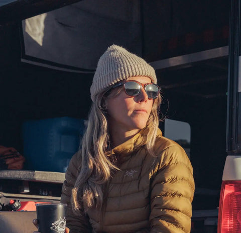 Woman wearing Top Shelf Shatterproof Sunglasses And Work Safety Shades Featuring Premium Polarized Grey Lenses For Men And Women Encased In A Dope Gloss Tortoise Build Packing Serious Uv Defense.