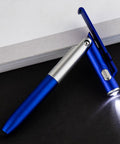 5 Must-Have Multifunctional Ballpoint Pens With 4-In-1 Writing, LED Light, Foldable Phone Stand, Smooth Fast-Dry Ink, Smudge-Resistant, Clip On Pocket Or Notebook, Lightweight Desk Accessory Gift blue pen with LED light on notebook